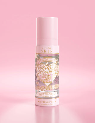 A pink bottle of P.Louise Forever Set Bridal Setting Spray against a light pink background